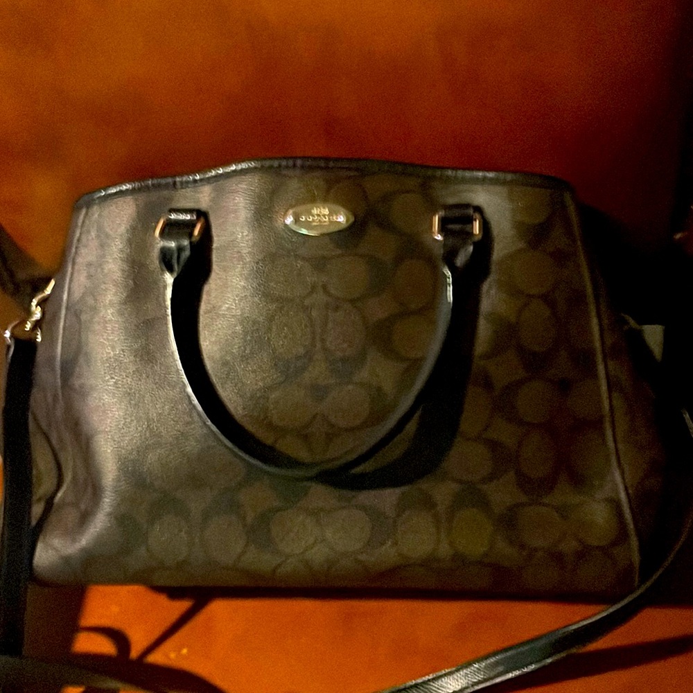 Chocolate brown and black Coach purse